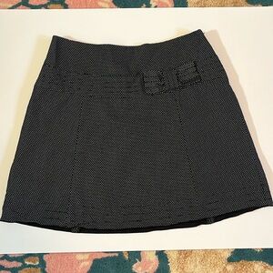 Super cute, black white polkadot mini skirt with subtle bow accent
